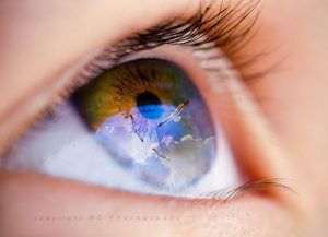 child's eye looking toward Heaven