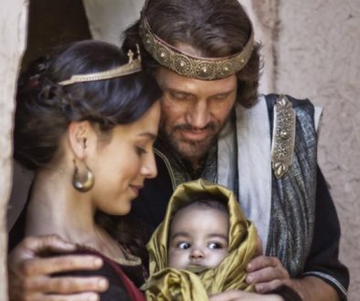 David and Bathsheba holding baby Solomon and gazing at him adoringly